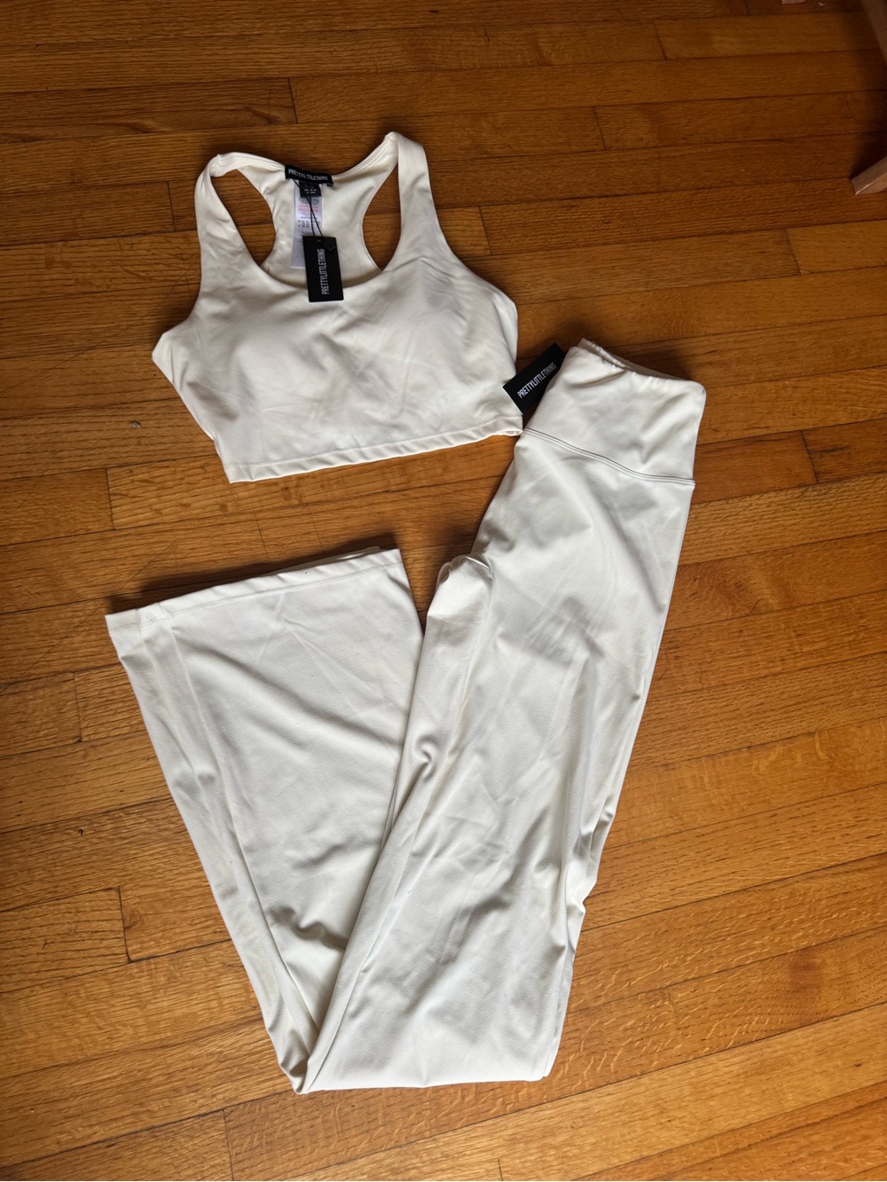 PLT Cream High-Waist Flared Active Pants and sports bra